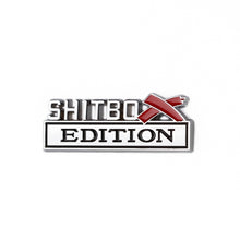 Sh*tbox Edition - One Plastic Vehicle Badge / Black or Chrome