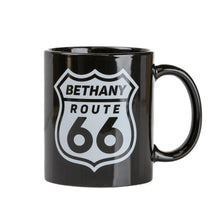 Black mug with 'Bethany Route 66' design on a white background