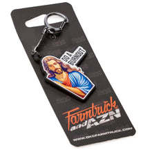 Keychain with religious design on a black card with branding