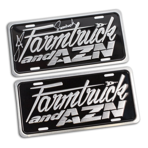 two license plates with farmtruck and azn logo embossed on them