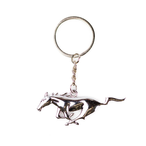 A chrome keychain in the shape of a horse.