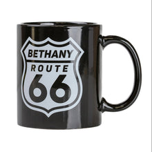 Black mug with 'Bethany Route 66' design on a white background