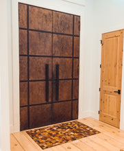 Jean tag quilted rug displayed as door mat in front of home entry door