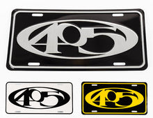 A collection of 405 embossed aluminum car plates in various colors, featuring the numeric '405' in a stylized font.