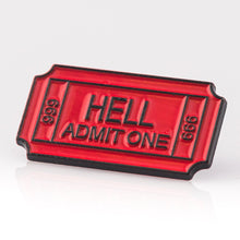 A red and black enamel pin with the text 'HELL ADMIT ONE' on it.